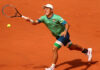 Marathon man Kei Nishikori through in five