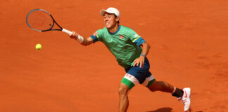 Marathon man Kei Nishikori through in five